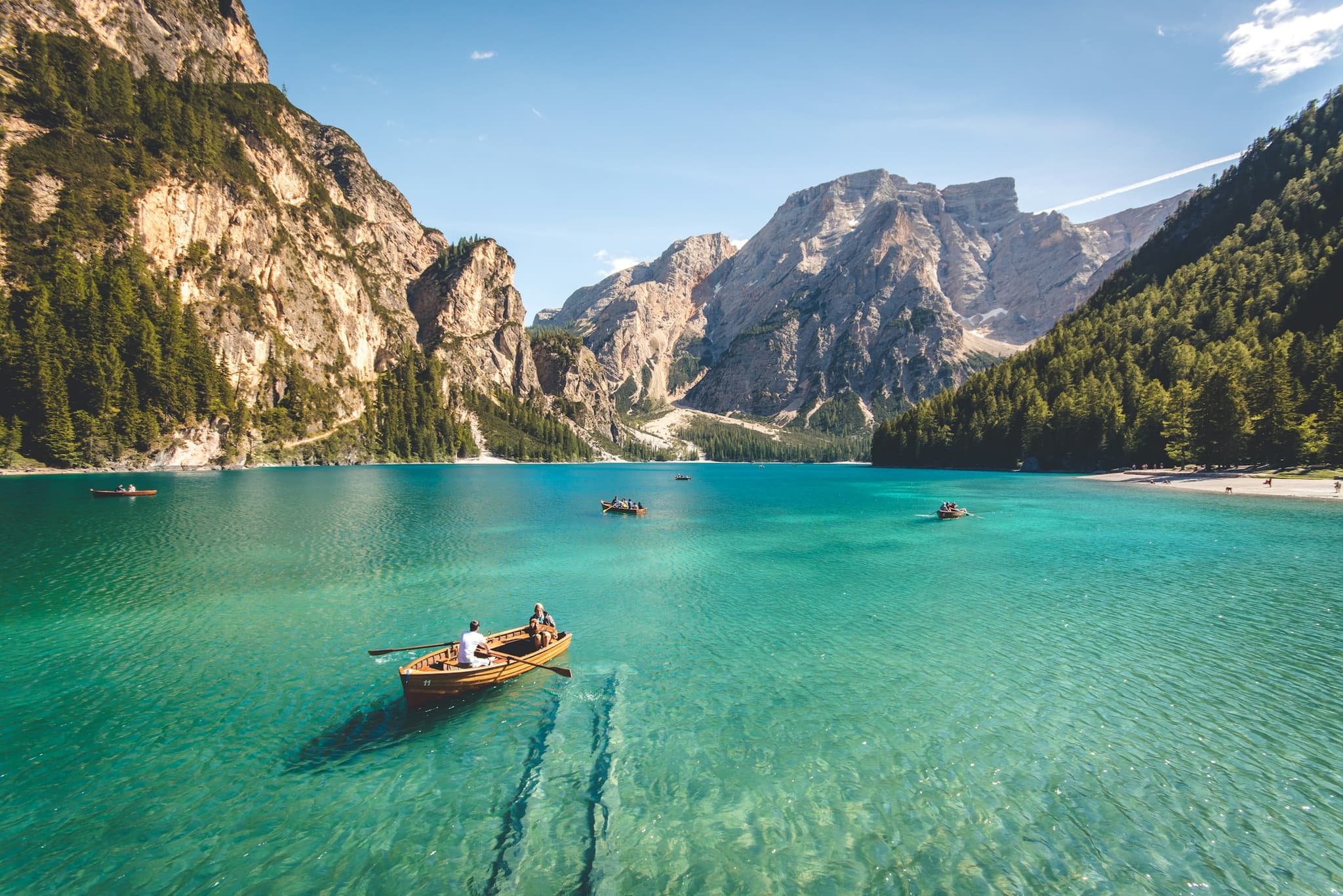 An alpine lake beneath snow-capped mountains